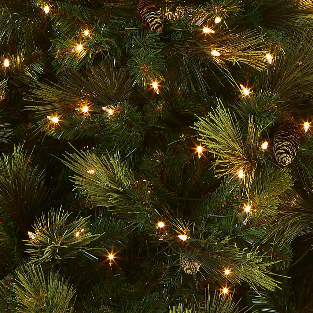 Artificial Holiday Prelit Christmas Tree with 750 Clear Lights, Pinecones, and Metal Stand A566715