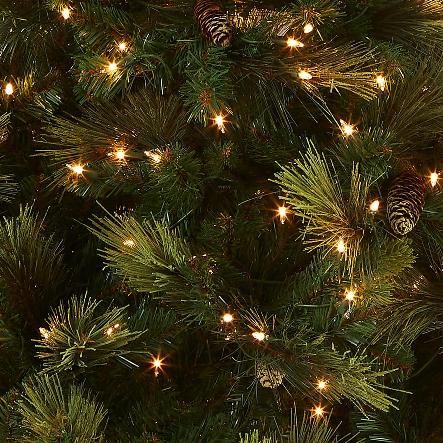 Artificial Holiday Prelit Christmas Tree with 750 Clear Lights, Pinecones, and Metal Stand A566715